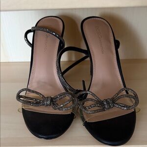 BCBGeneration Black and Gold Bow Heels
